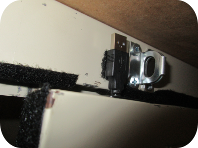 web cam USB cord with door closed